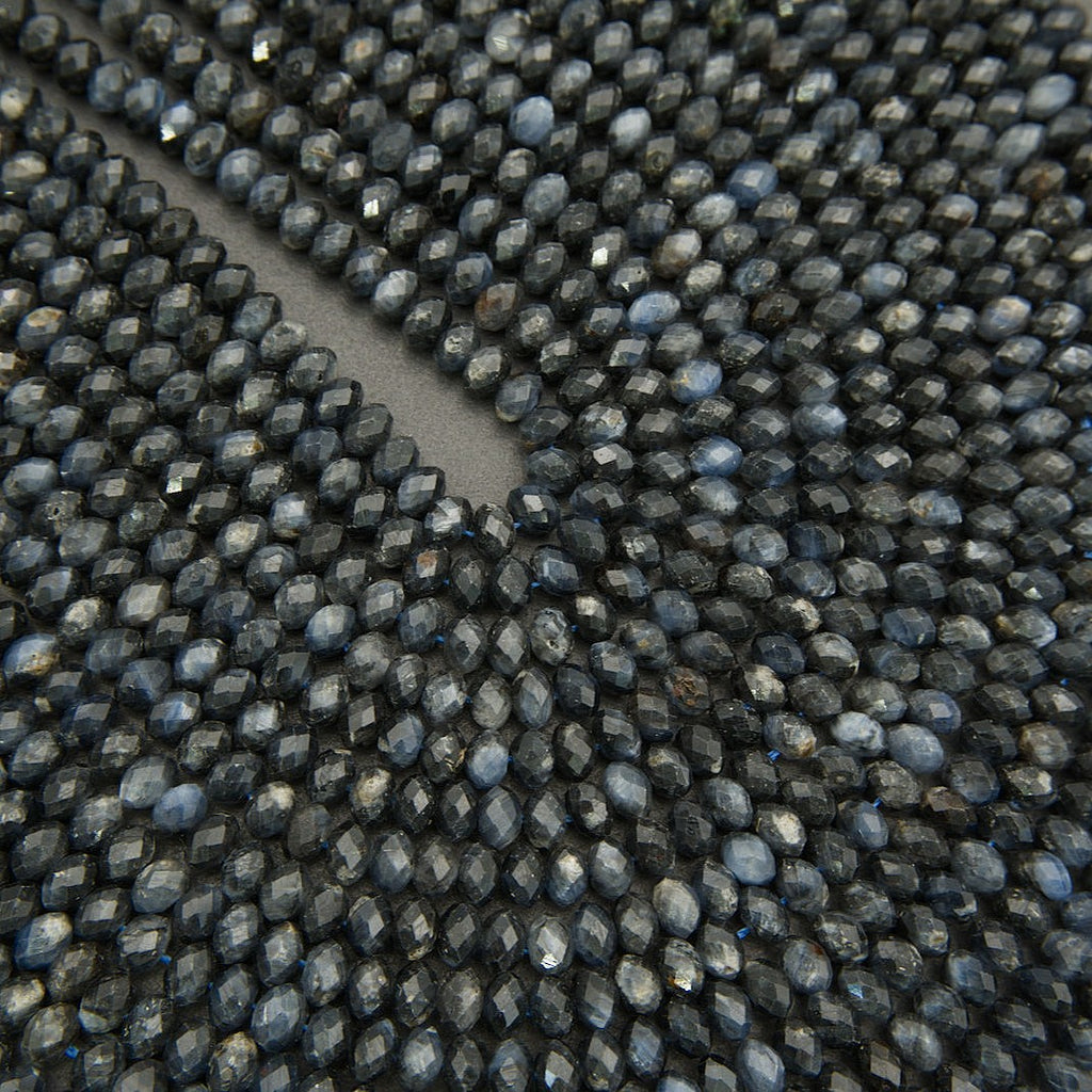 Close-up of a textured black surface with small raised beads
