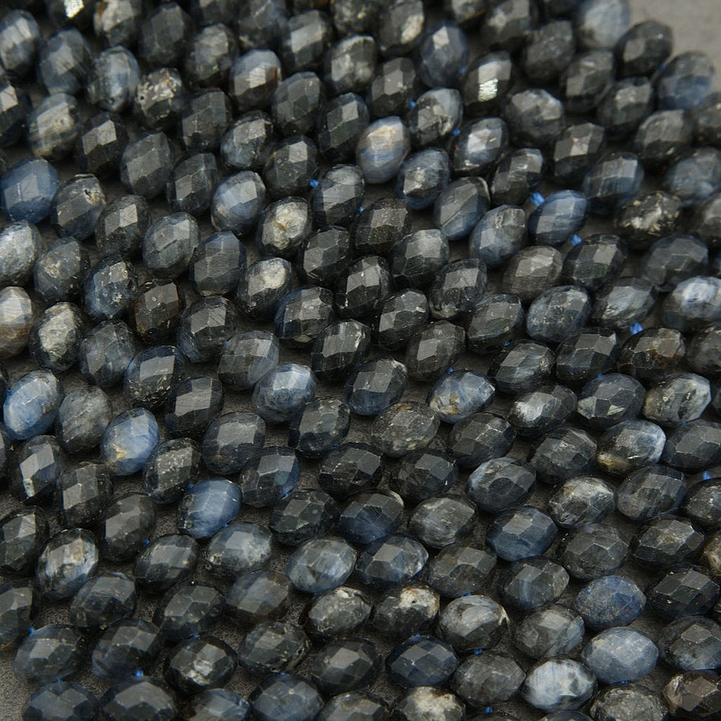 Close-up of dark blue faceted beads