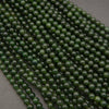 Close-up of green beads on a gray background