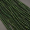 Close-up of green beads on a gray background