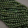Close-up of green beads on a gray background