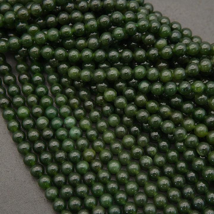 Close-up of green beads on a gray background