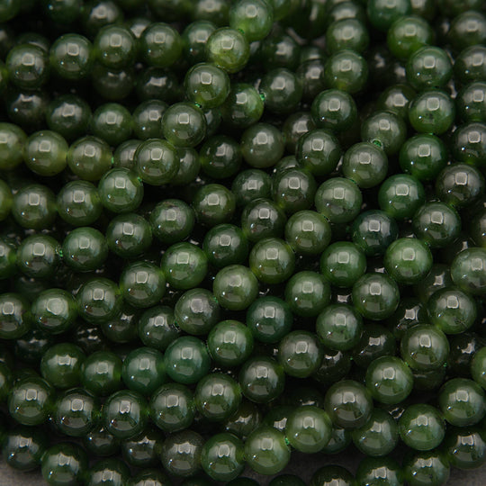 Close-up of green beads stacked together