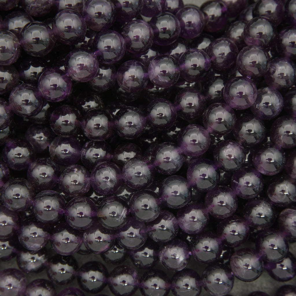 Close-up of purple beads with a blurred background