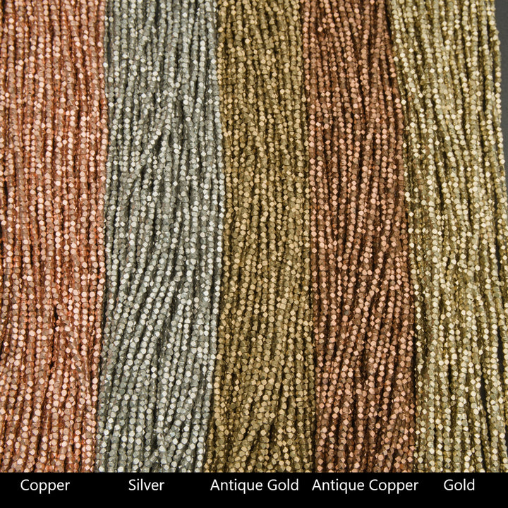 Close-up of metal beads in various colors including Copper, Silver, Antique Gold, Antique Copper, and Gold.