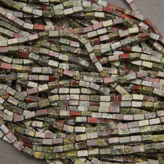 Dragon Blood Jasper rectangular beads featuring deep green and earthy red tones with natural mottled patterns.
