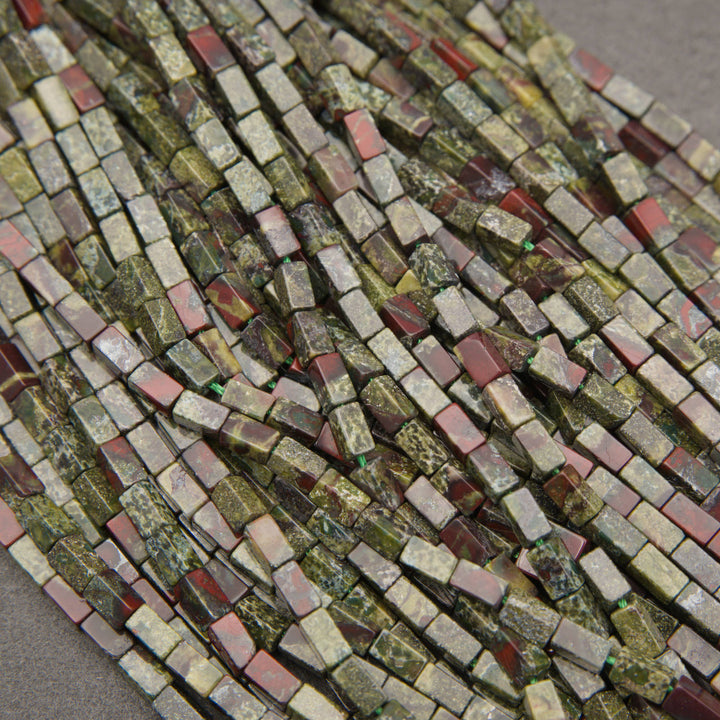 Small rectangular Dragon Blood Jasper gemstone beads in olive green, burgundy, and rusty red shades.