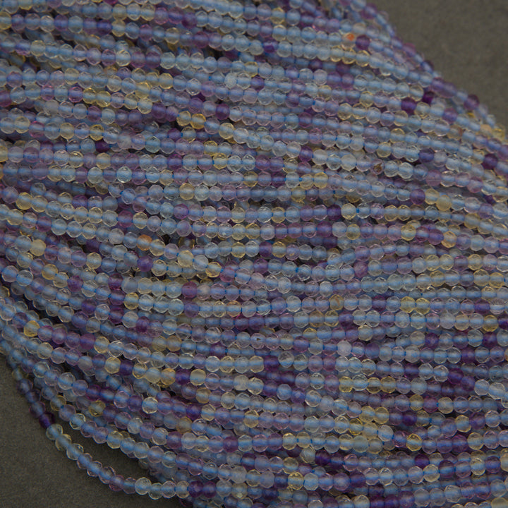 Close-up of multicolored beads on a string