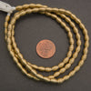 Ribbed brass beads, textured cylindrical spacers in warm metallic gold tones