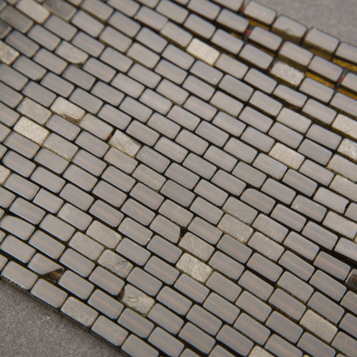 Strands of rectangular golden obsidian beads with dark brown coloration and a distinctive golden sheen.