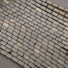 Strands of rectangular golden obsidian beads with dark brown coloration and a distinctive golden sheen.