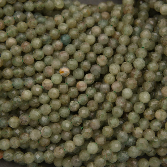 Close-up of green beads on a dark background