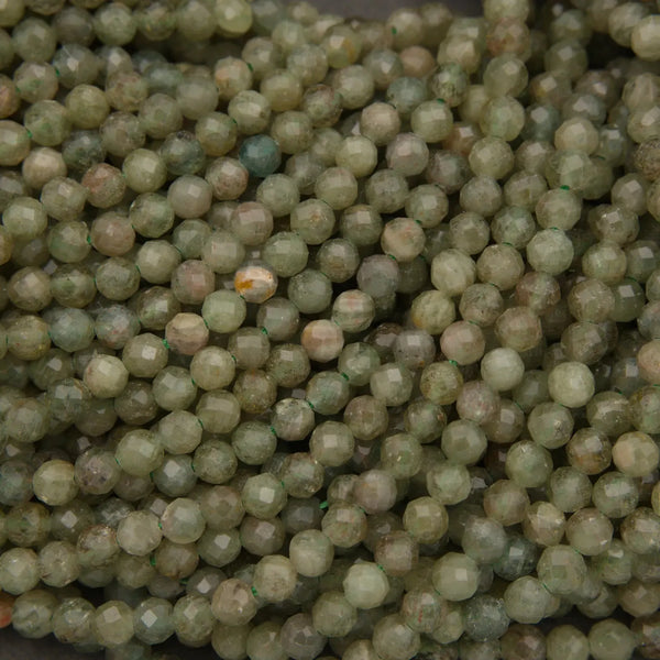 Close-up of green beads on a dark background