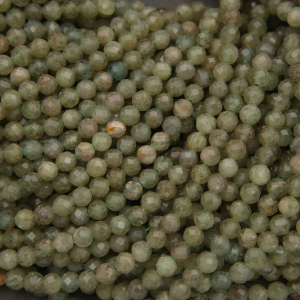 Close-up of green beads on a dark background