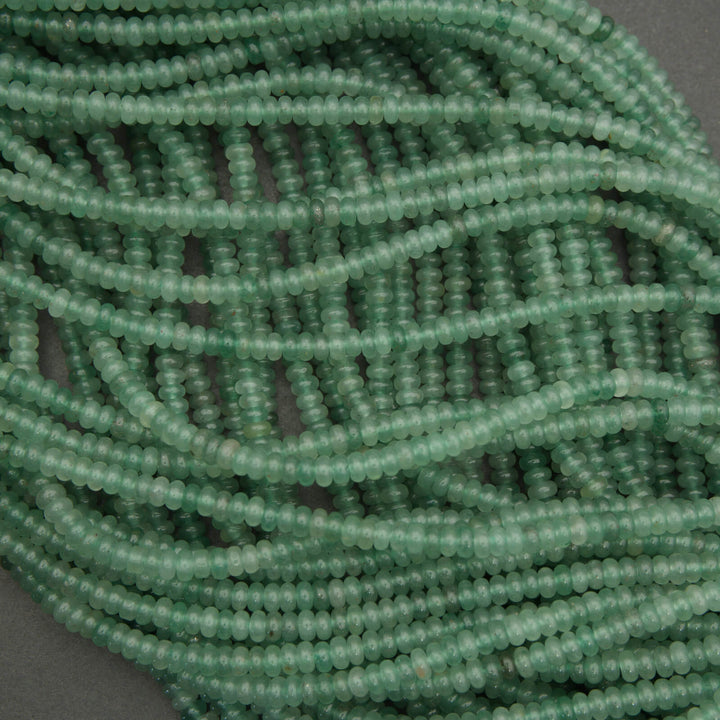 Green aventurine spacer beads smooth rondelle shape semi translucent green