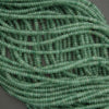Green aventurine spacer beads smooth rondelle shape semi translucent green