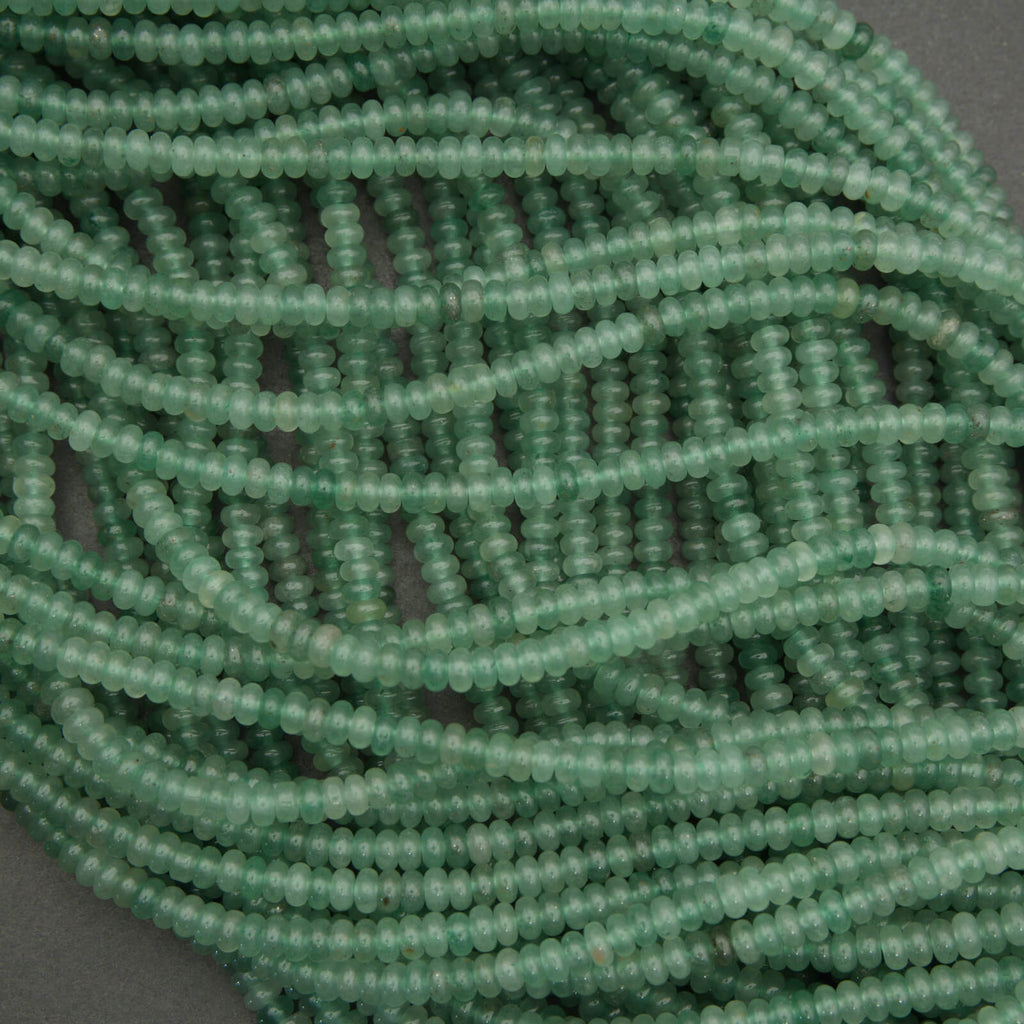 Green aventurine spacer beads smooth rondelle shape semi translucent green