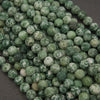 Green Tree Agate beads with moss-like green patterns