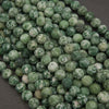 Green Tree Agate beads with moss-like green patterns