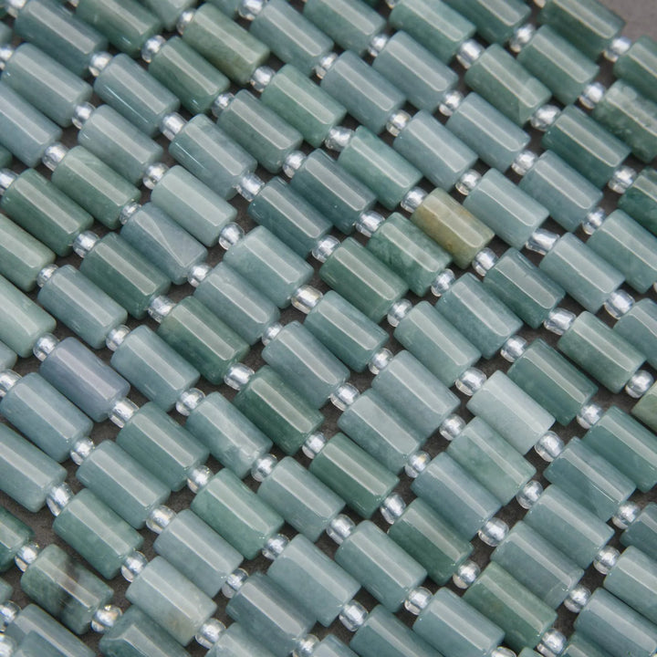 Close-up of green beads with spacers