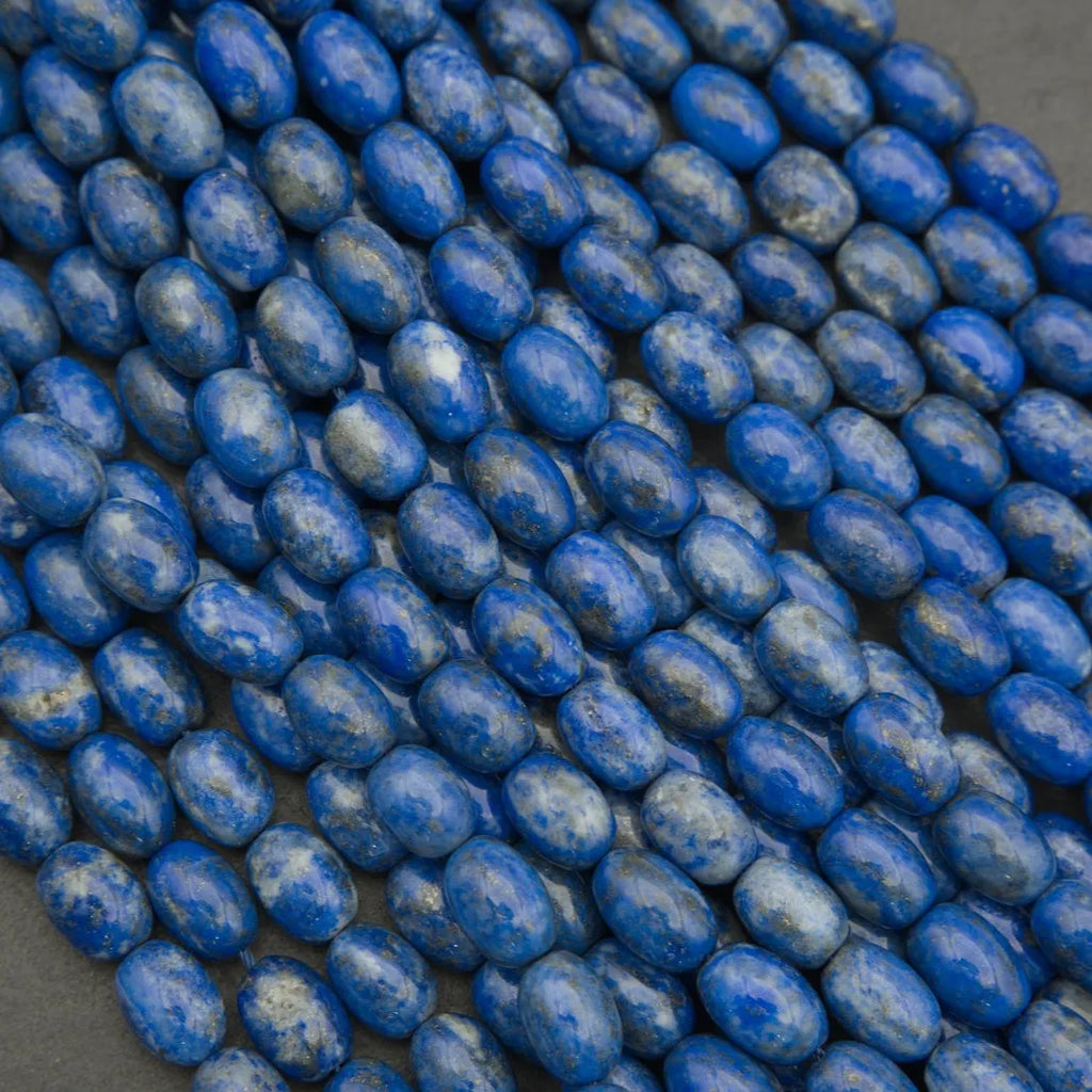 Close-up of blue beads on a dark background
