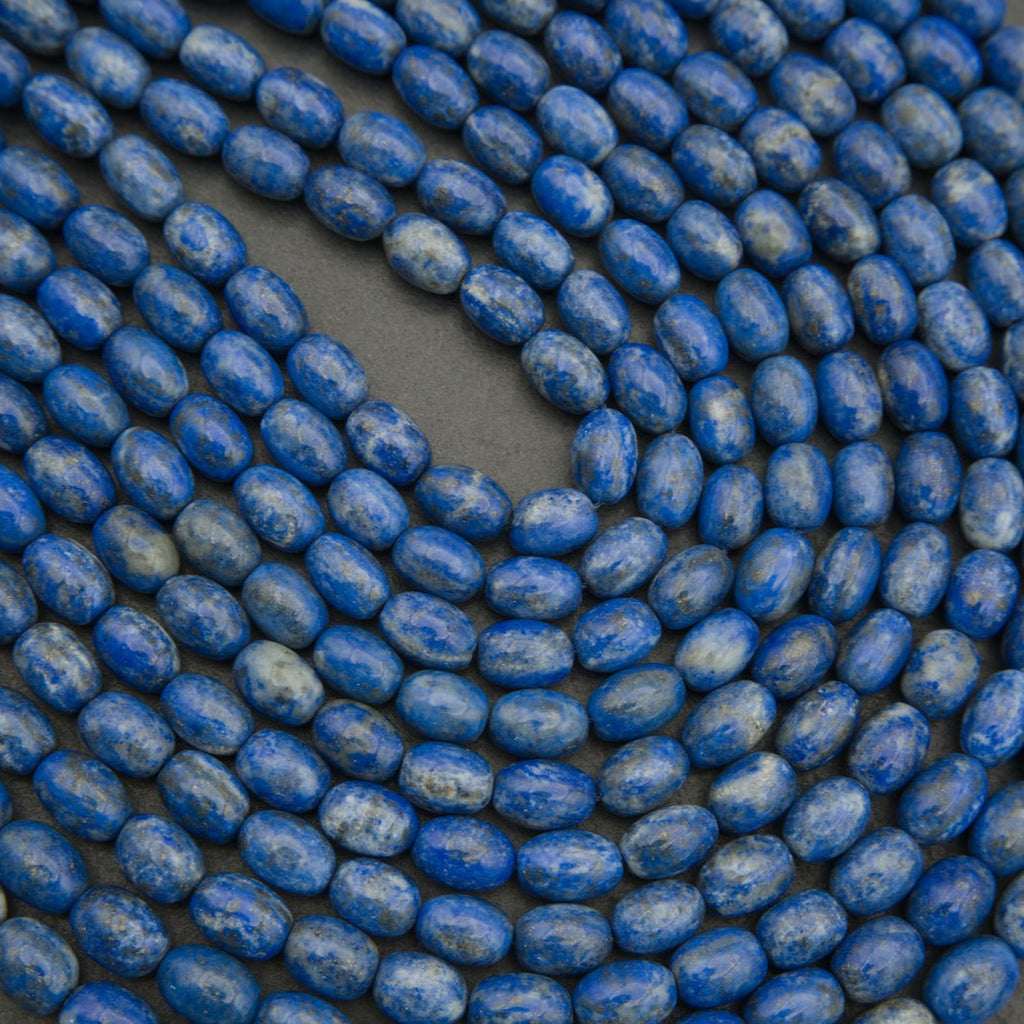 Close-up of blue beads on a dark background