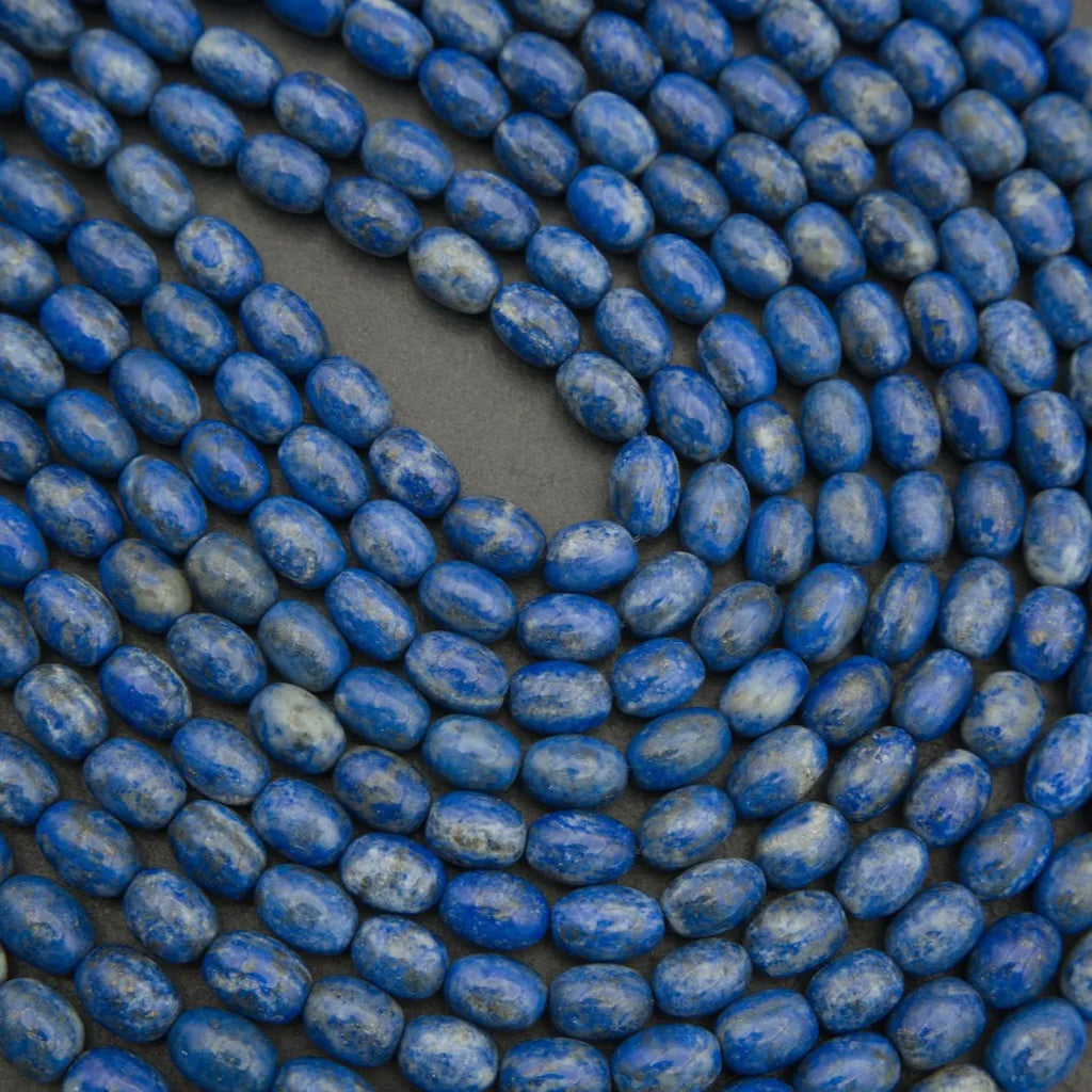 Close-up of blue beads on a dark background