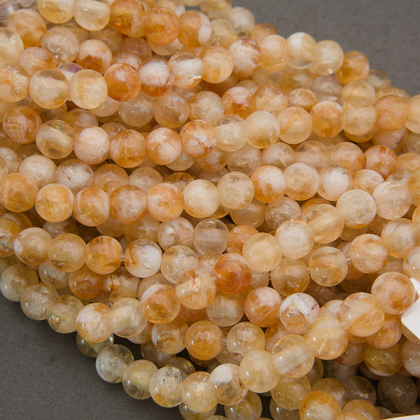 mooth citrine gemstone beads in translucent yellow