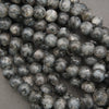 larvikite polished round beads.