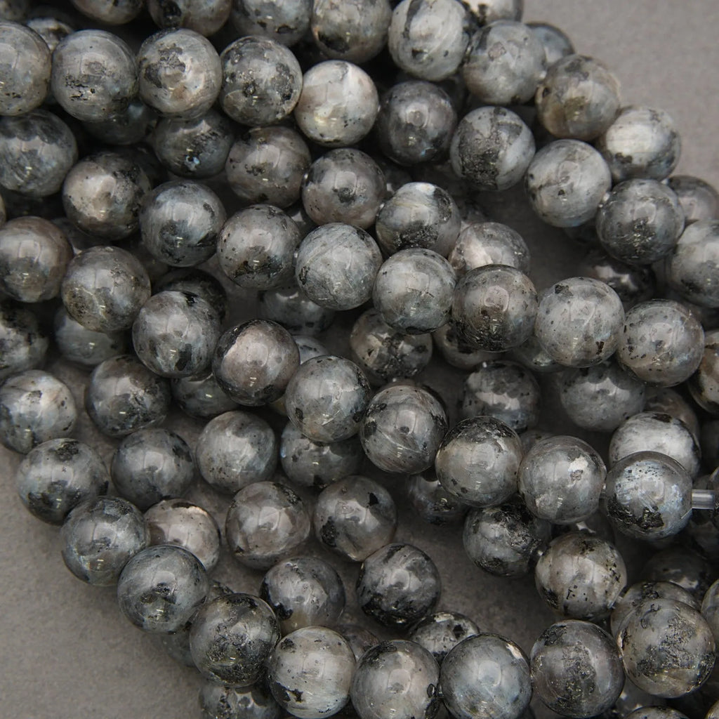 larvikite polished round beads.