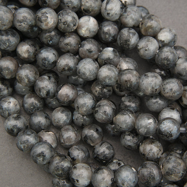 larvikite polished round beads.