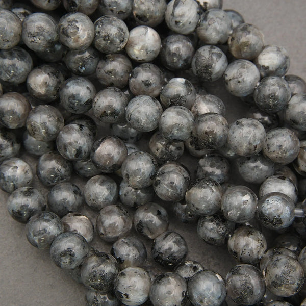larvikite polished round beads.