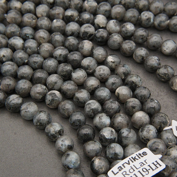 Grey marbled larvikite stone beads.