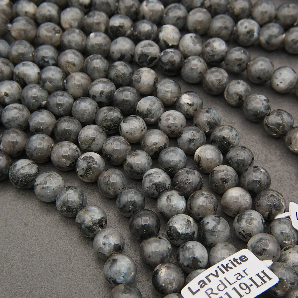 Grey marbled larvikite stone beads.