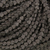 Black lava stone heart beads with a matte finish and naturally porous volcanic texture for jewelry making.