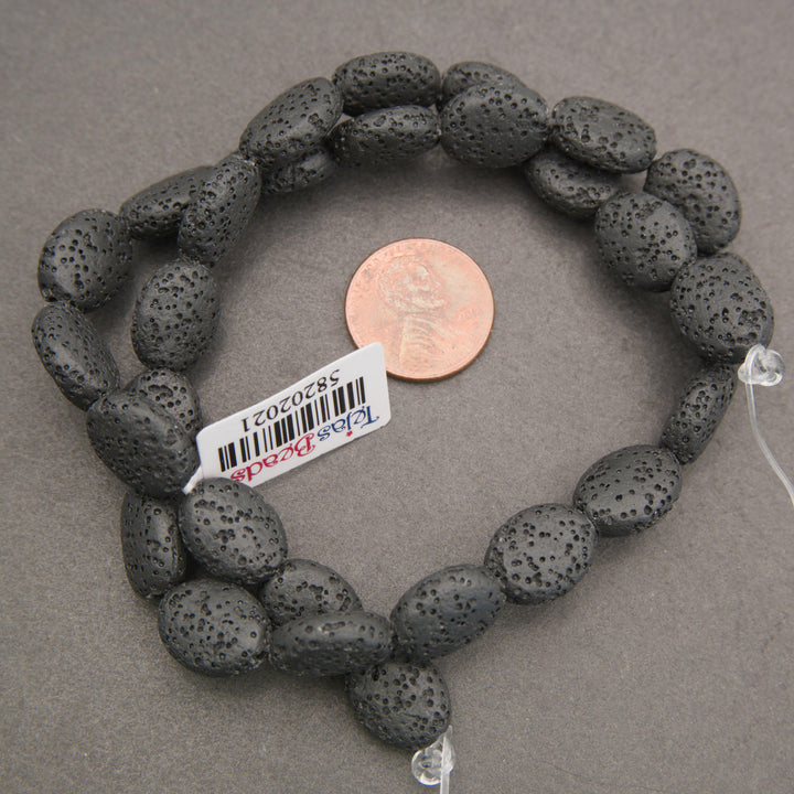 Black lava rock oval beads with a porous, lightweight texture, perfect for DIY jewelry making and beading projects