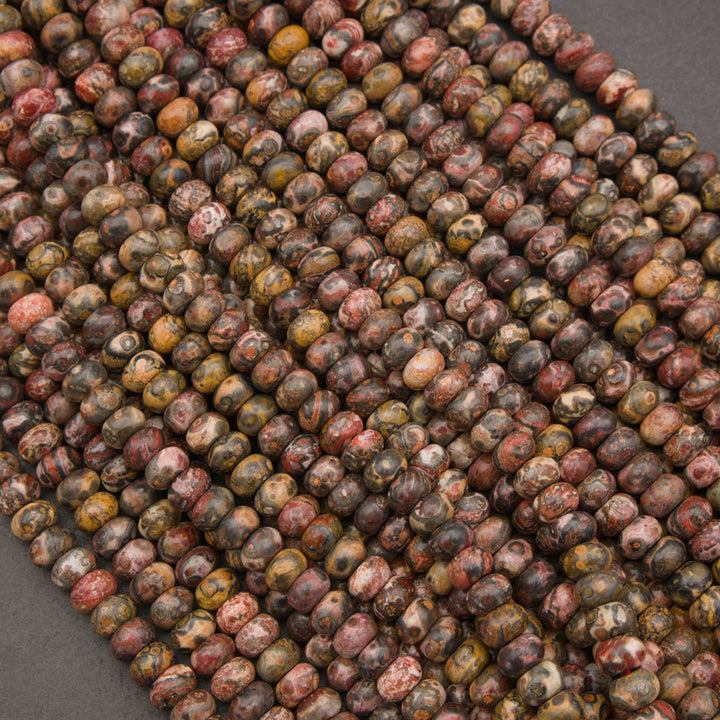 Natural Leopard Skin Jasper rondelle beads in earthy brown, tan, and red tones