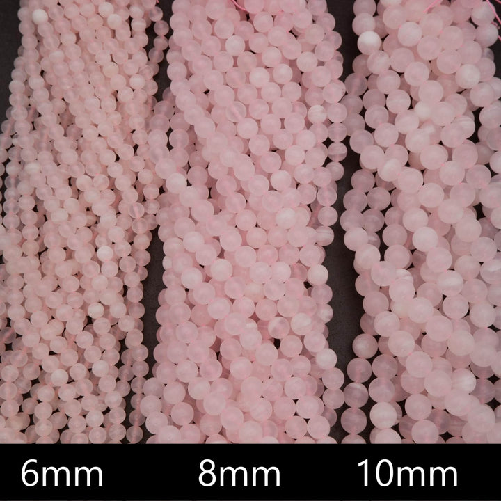 Close-up of pink beads with size labels 6mm, 8mm, and 10mm.