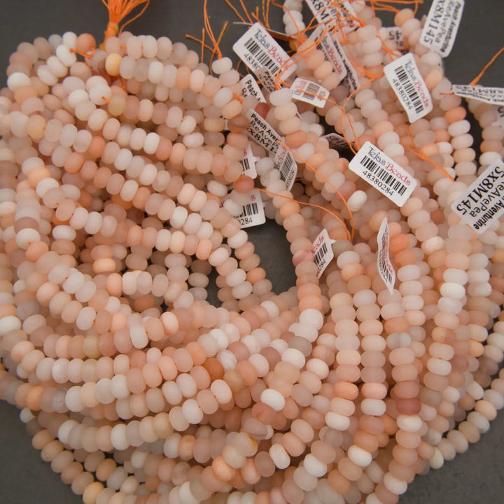 Natural stone Peach Aventurine beads with a frosted matte finish.