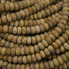 Close-up of beige and brown stone beads