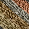 Close-up of textured fabric with brown, beige, and gray colors.