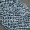 Strand of faceted blue kyanite beads with subtle silk-like texture