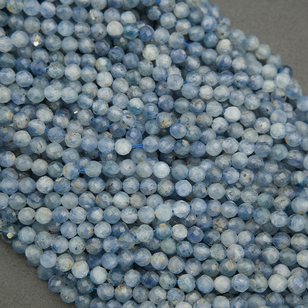 Strand of faceted blue kyanite beads with subtle silk-like texture