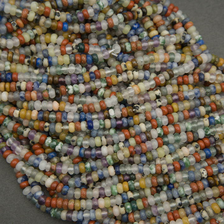 Close-up of multicolored beads on a gray background