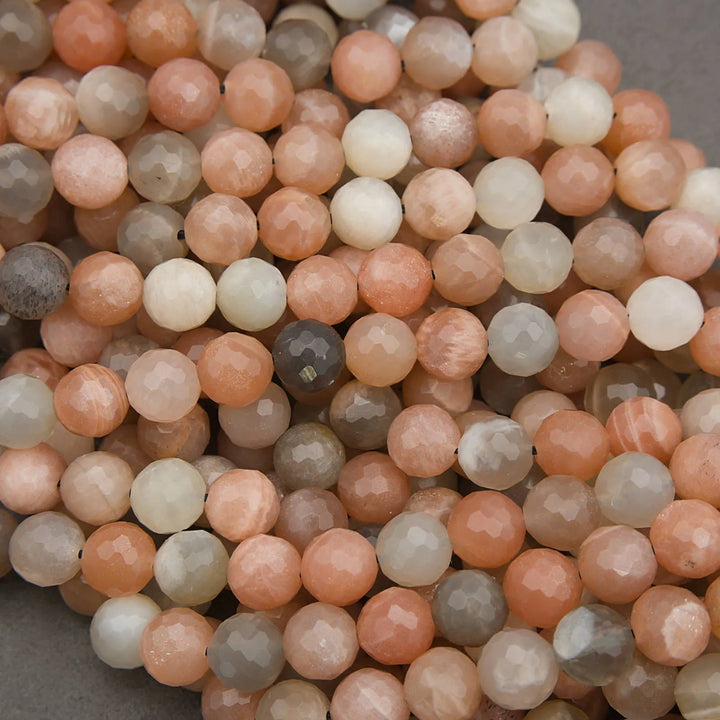 Close-up of multicolored round beads on a gray background