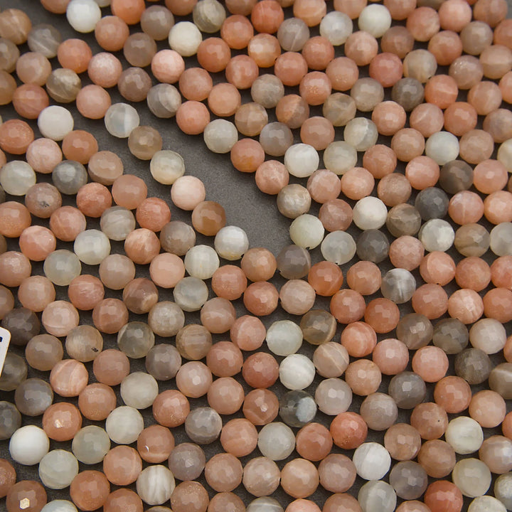 Close-up of multicolored round beads on a dark background