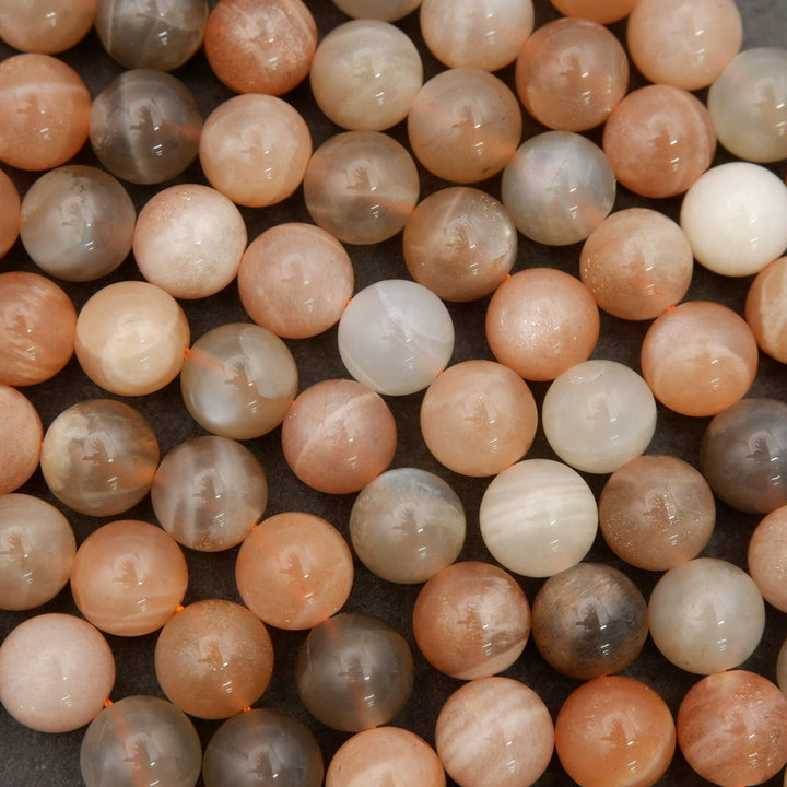 Close-up of multicolored round beads on a dark background
