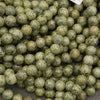 Russian Serpentine round beads in olive green with dark natural veining