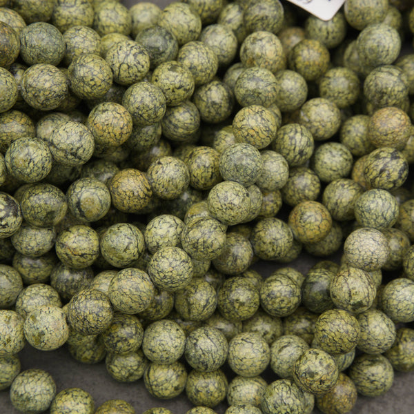Russian Serpentine round beads in olive green with dark natural veining