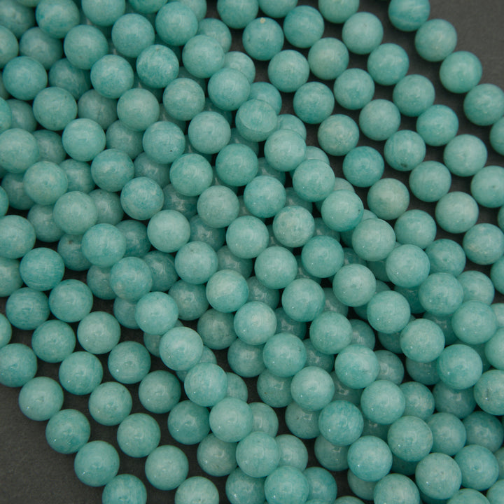 Turquoise beads on a dark background